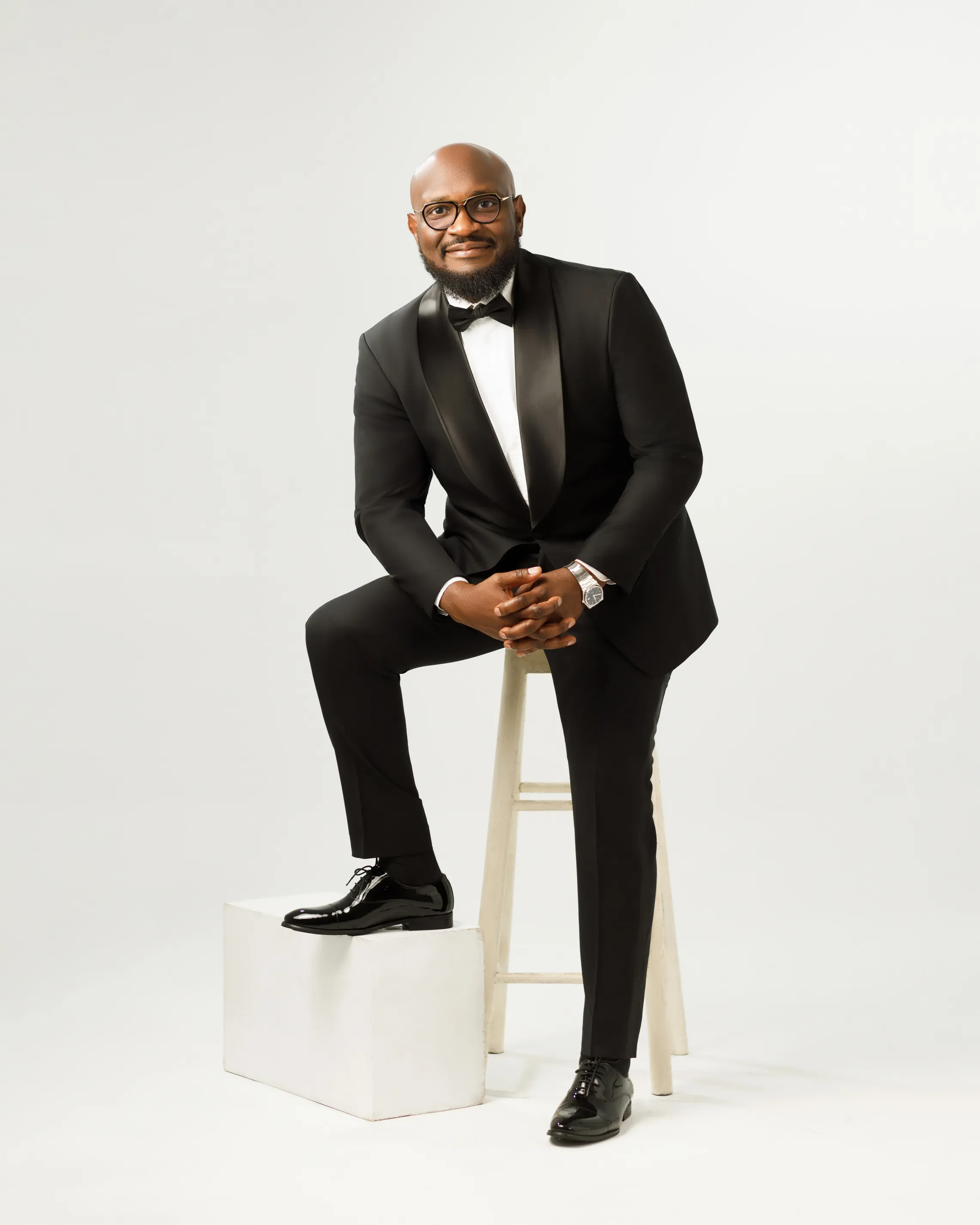 Mr. Steve looking thoughtfully away from the camera, studio portrait, Lagos.