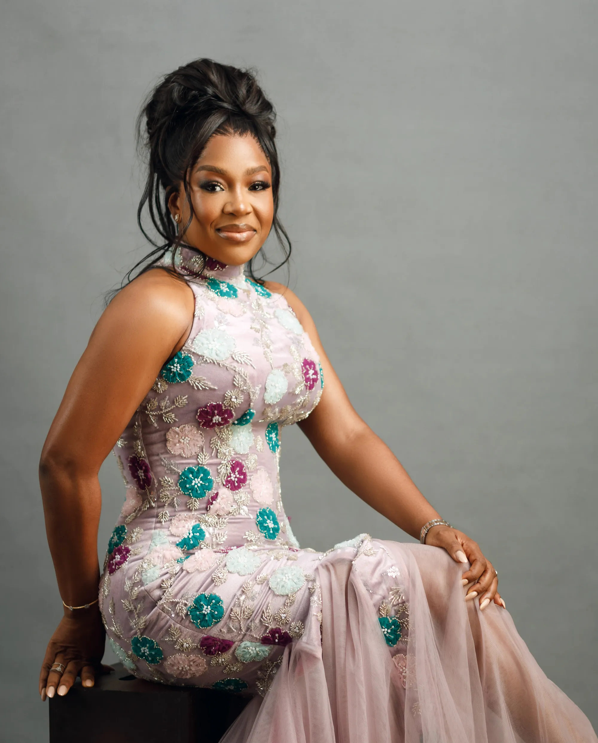 A black and white portrait of the Shola family.