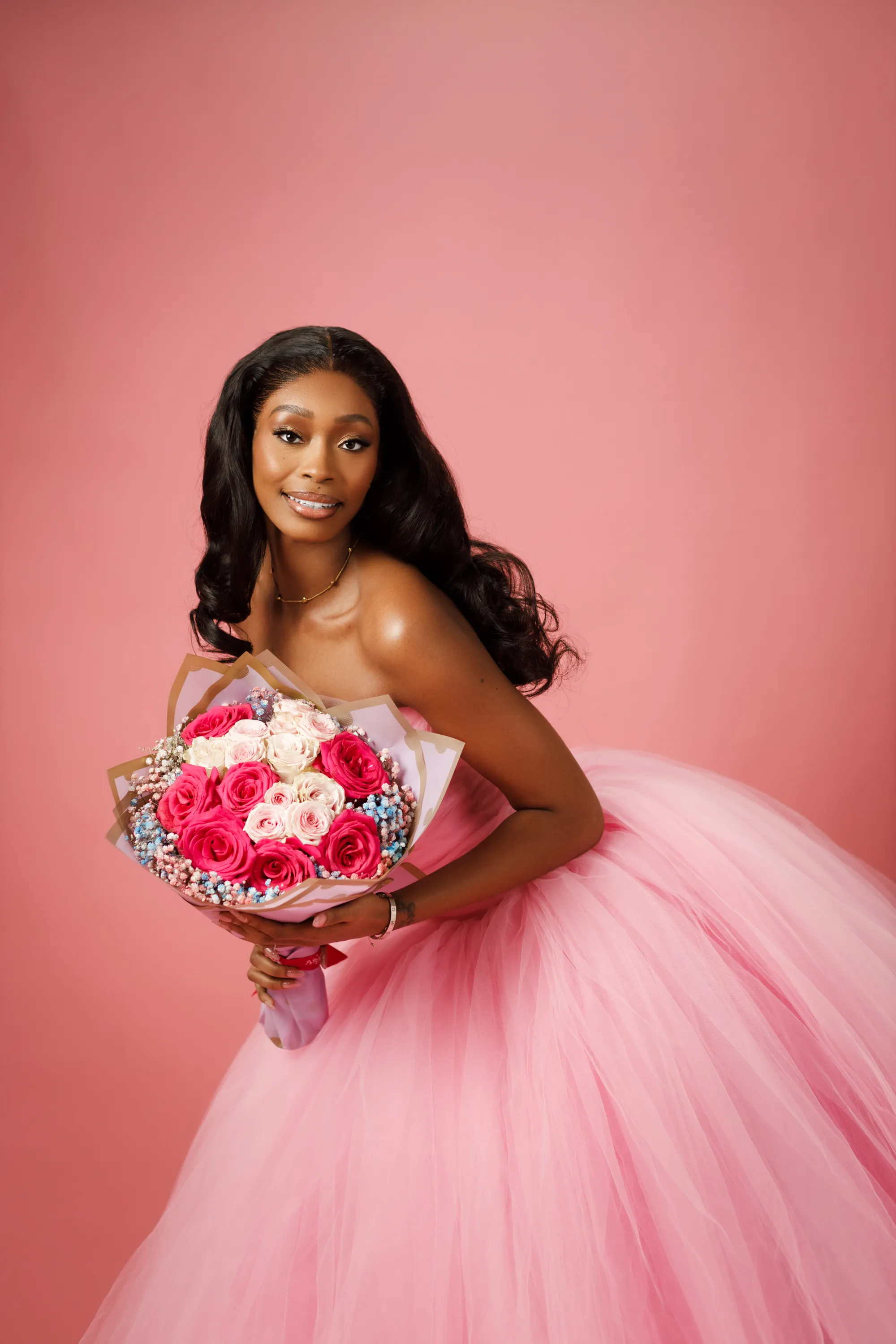 Elegant portrait of Nora West with a serene expression.